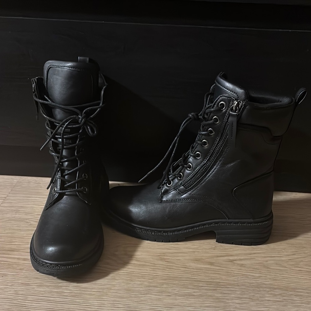 Black Combat Boots with Rugged Design and Sturdy Sole